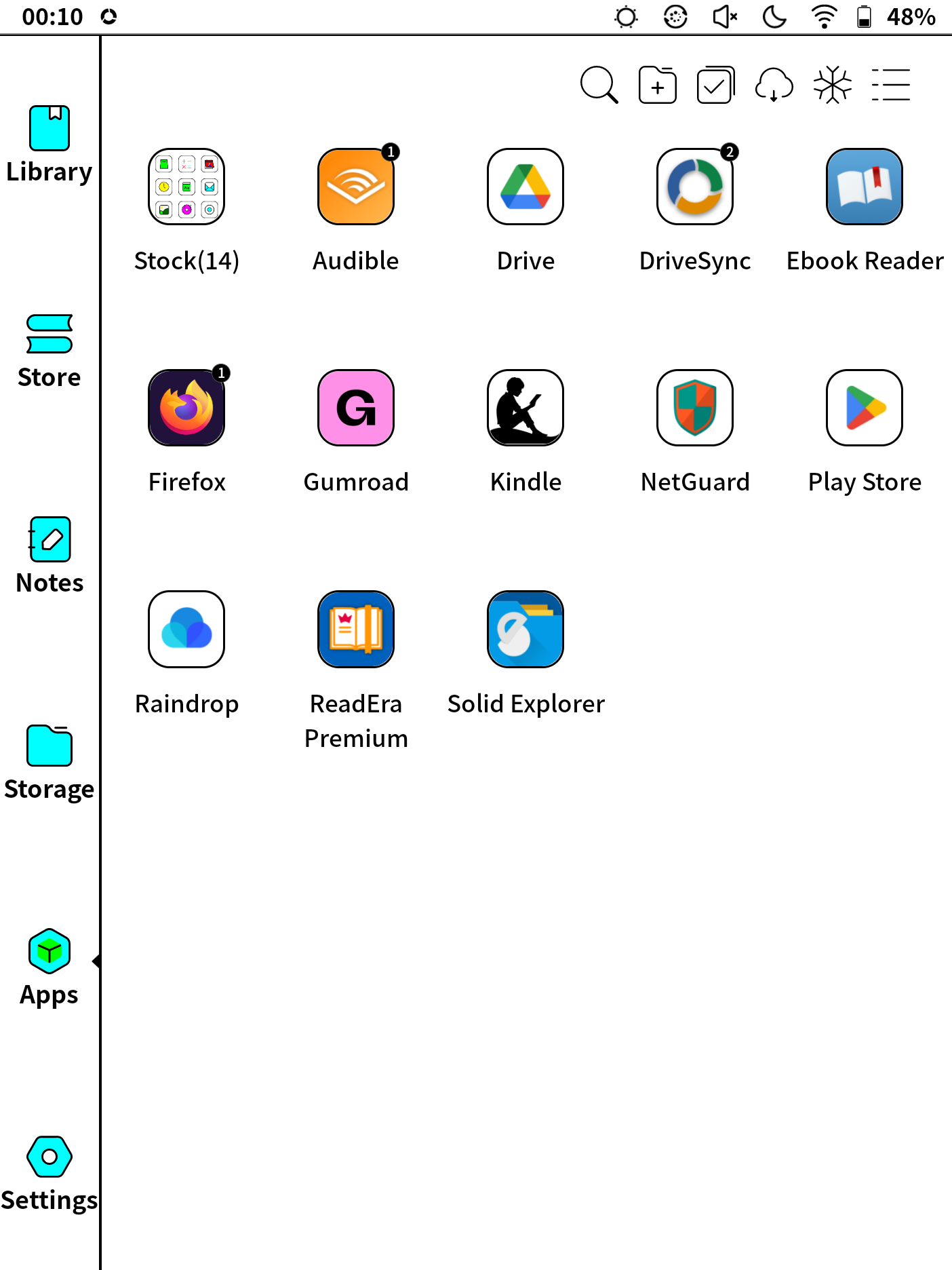 Homescreen with installed apps. From left to right and top to bottom: A folder called &ldquo;Stock&rdquo; with 14 items, Audible, Drive, DriveSync, Ebook Reader, Firefox, Gumroad, Kindle, NetGuard, Play Store, Raindrop, ReadEra Premium and Solid Explorer.