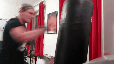 A perfectly looping GIF of me punching my heavy bag
