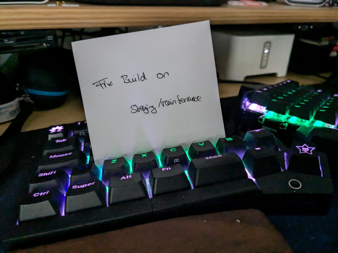 A note stuck into my keyboard saying &ldquo;Fix Build on staging/maintenance&rdquo;.