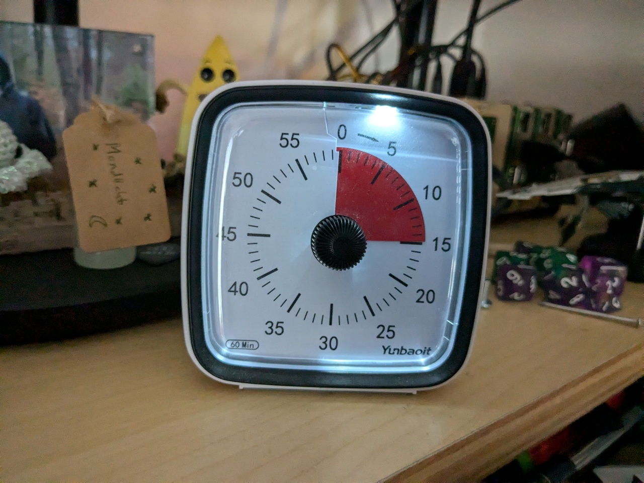 A visual timer set to 15min.