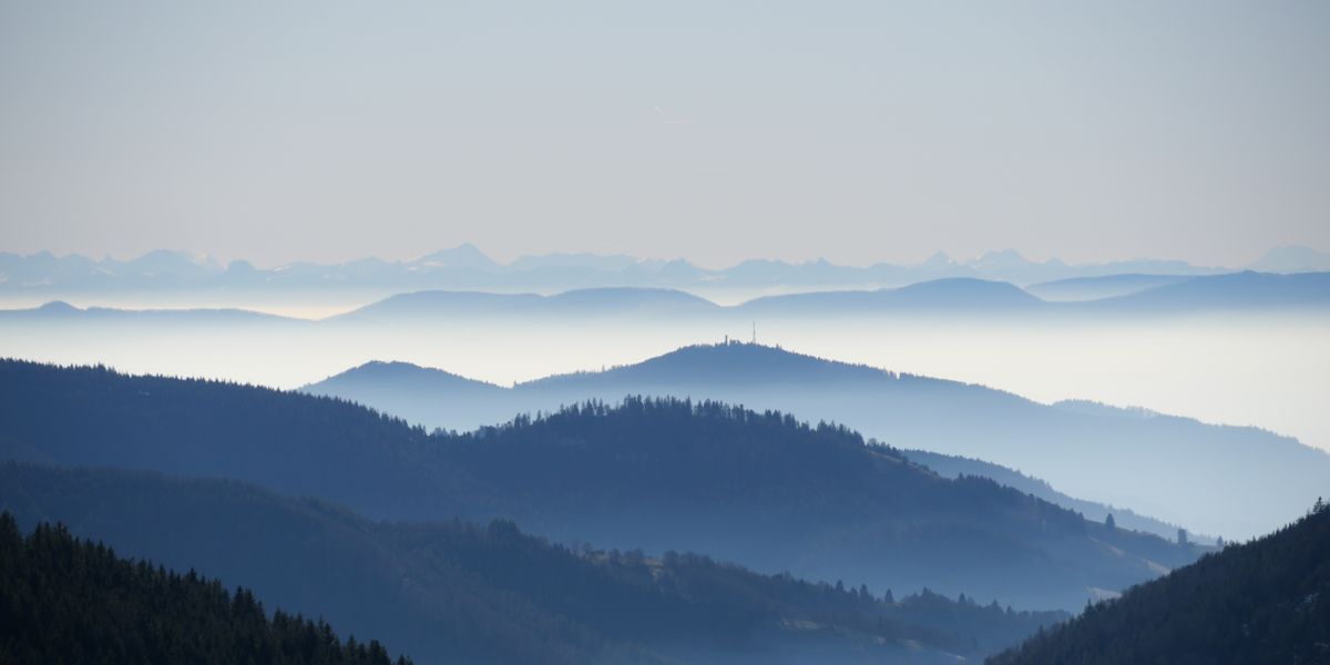 View of blue mountains in the fog