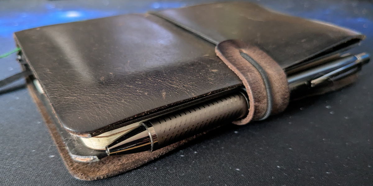 Picture of my closed journal lying on my desk