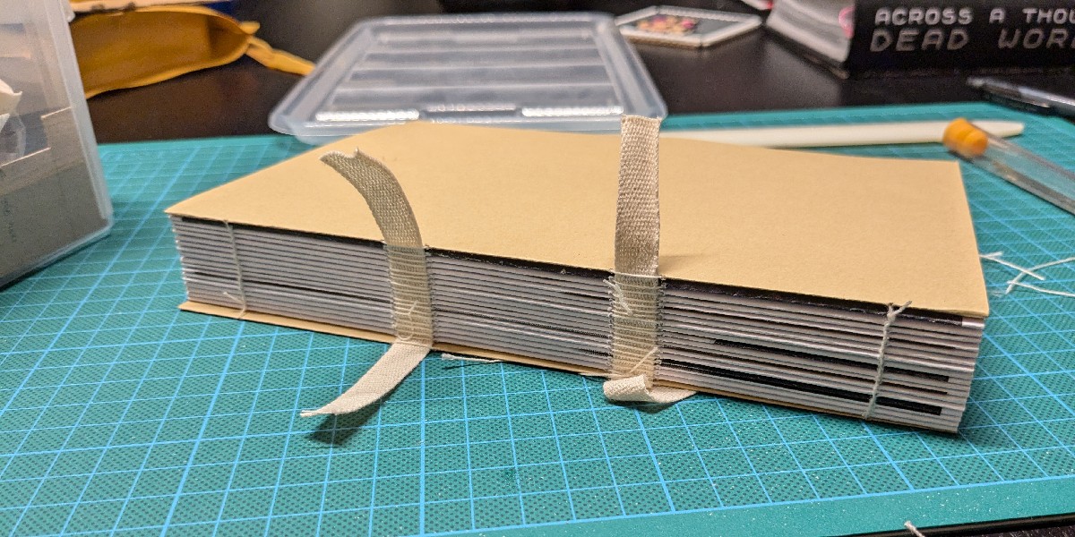 A text block getting prepared during book binding.