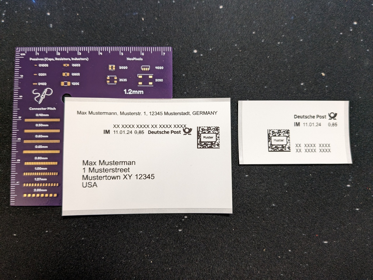 Printed stamp and printed stamp with address label, freshly printed from example files through the two scripts